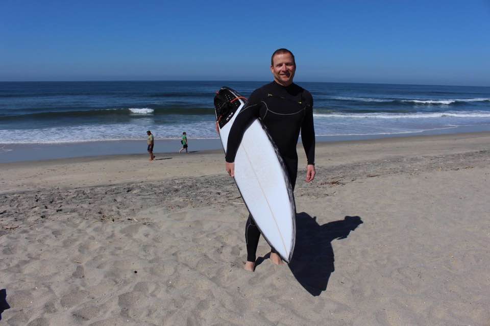 Lead Guitarist Tommy Fedak surfing San Diego